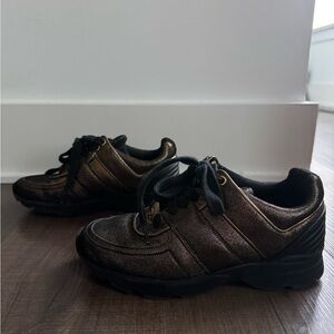 CHANEL Black and Gold Sneakers